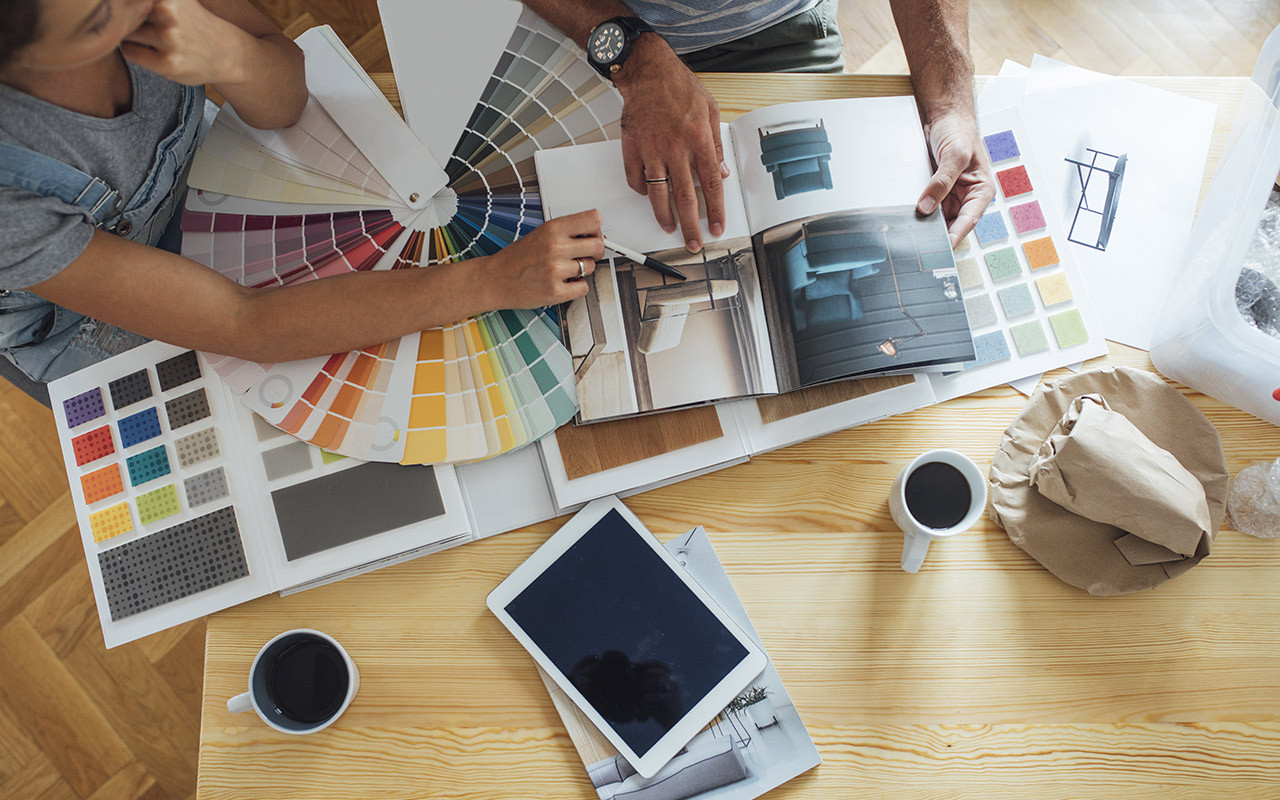 paint swatches and plans for a remodel